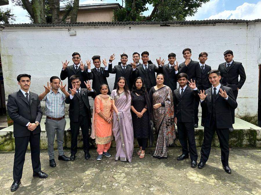 BIHM students celebrating with faculty